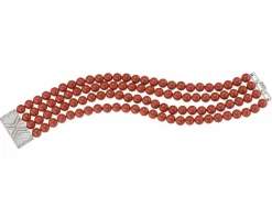 Bracciale unica ottone finitura rodiata con perle di maiorca rosse e zirconi Sovrani