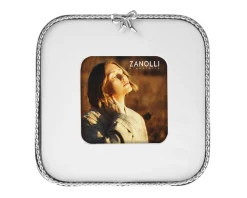 Cornice in metallo lucido con fiocco Selezione zanolli